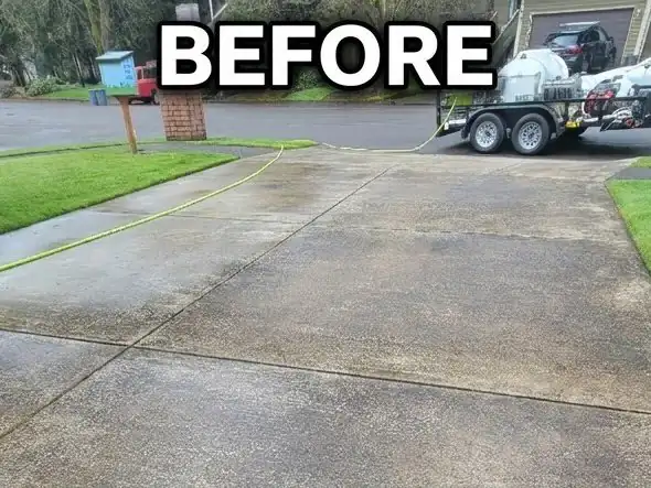 Dirty concrete driveway before pressure washing
