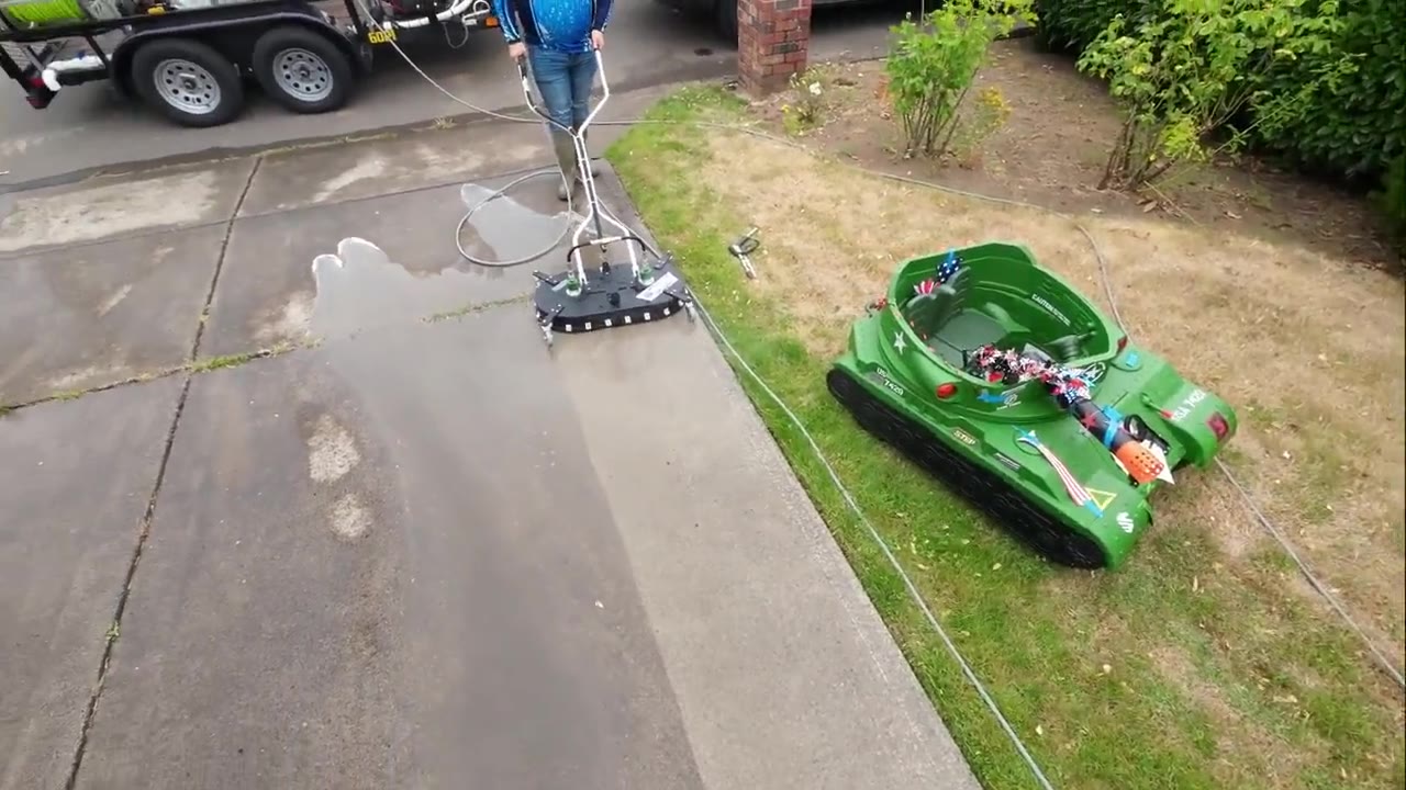Driveway pressure washing with a surface cleaner